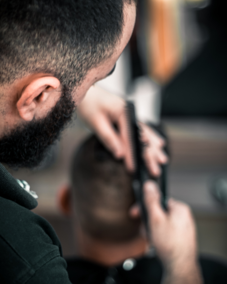 Barber Cutting (stock photo)